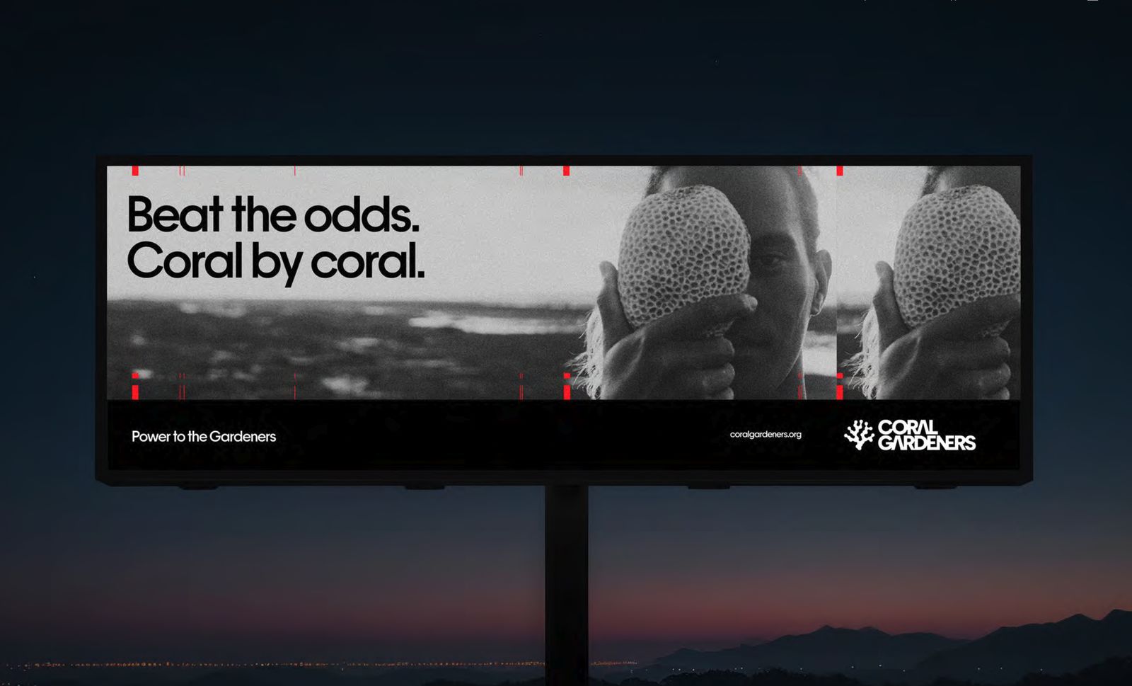 Billboard at dusk reading Beat the odds. Coral by coral.