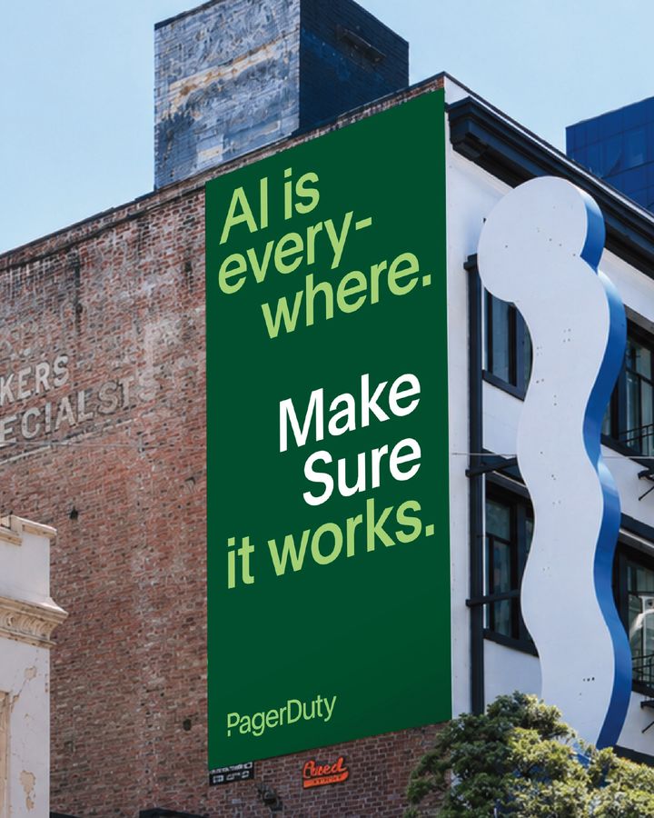 A PagerDuty building wrap reading AI is everywhere. Make Sure it works.