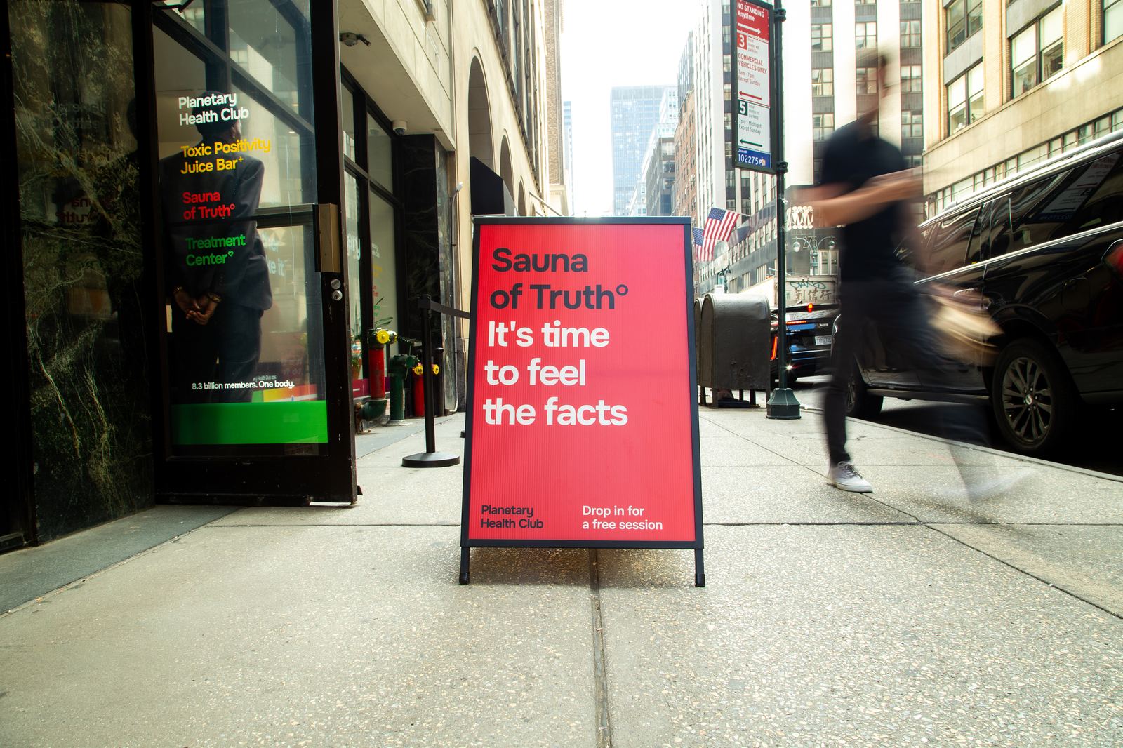 A sidewalk sign reading Sauna of Truth. It's time to feel the facts